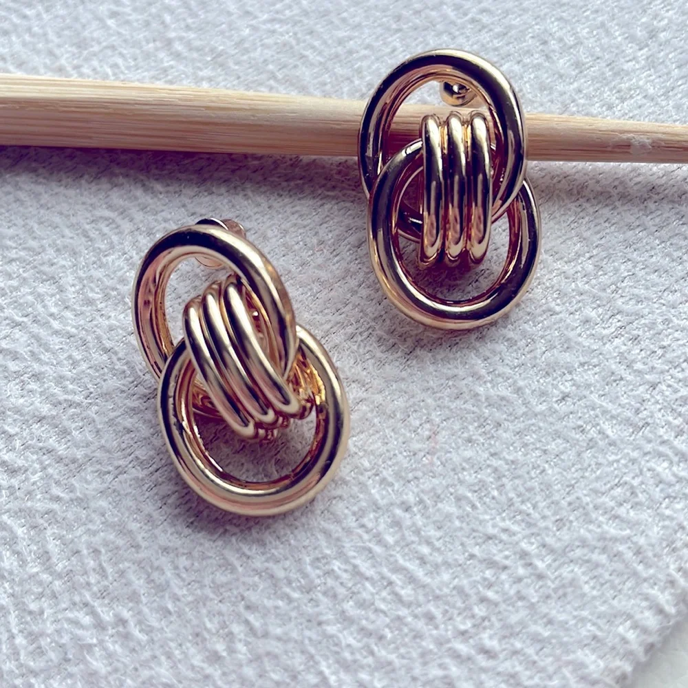Gold double knot stud earrings